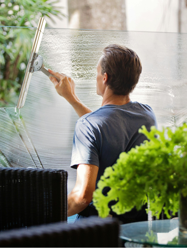 Man cleaning a window